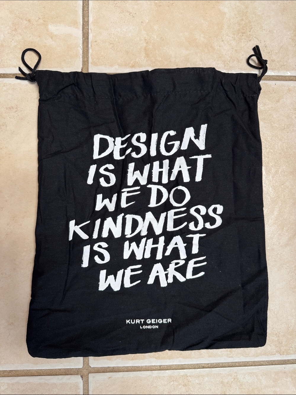 Kurt Geiger Black Drawstring Dust Bag with White Slogan Text